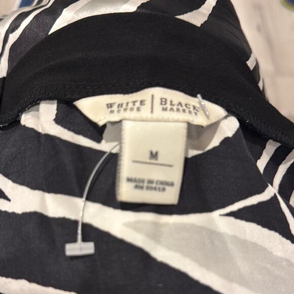 Chic Black and White Sleeveless Top - Picture 7 of 8